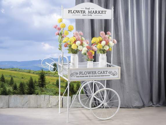White metal display cart decorated with sign