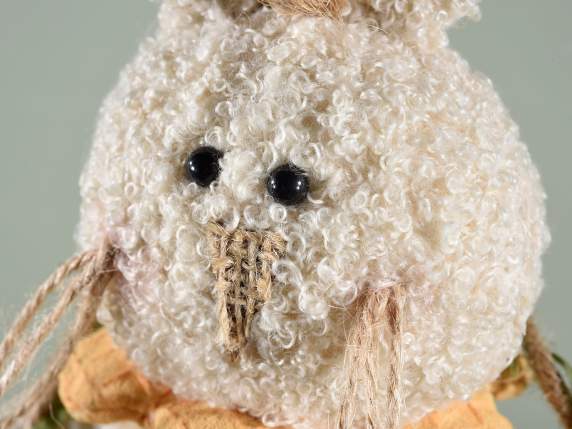 Fabric bunny on a swing to hang