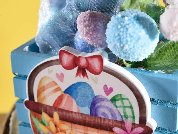 Colorful wooden basket with fence Easter decorations