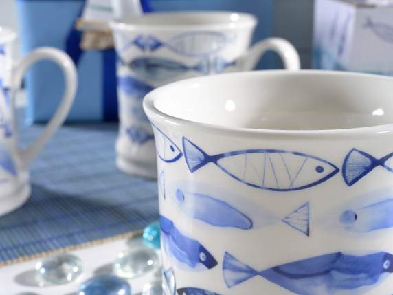 Porcelain mug with little fish in gift box