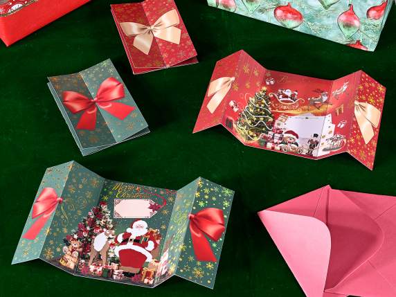 Folding Christmas greeting card with golden decorations