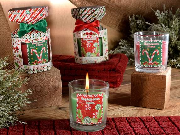 Scented candle in glass jar with sweet decorations