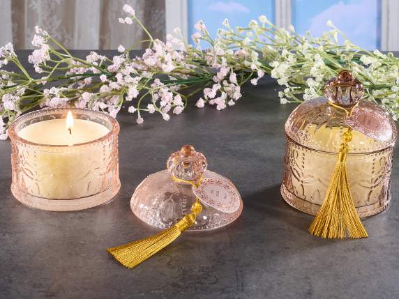 Scented candle in a glass jar with tassel