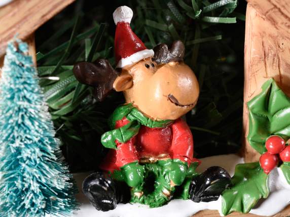Hanging resin house with Christmas character