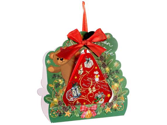 Hanging house-shaped metal box in a Christmas-themed package