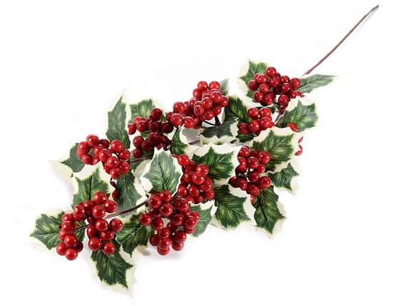 Holly branch and artificial red berries