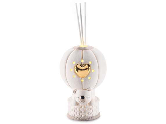 Hot air balloon with porcelain bear and lights with perfume