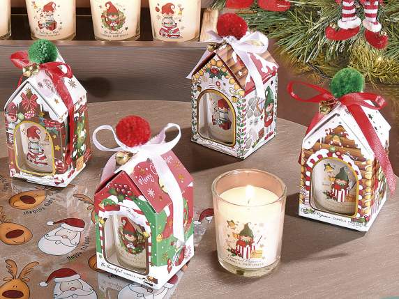 Scented candle in a glass with an elf decoration