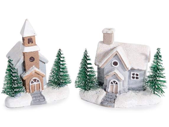 Snowy resin house with snowy trees