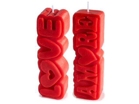 Red lovers candle with shaped writing