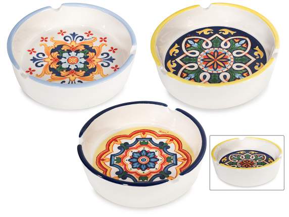 Ceramic ashtray with majolica decorations and colored edge