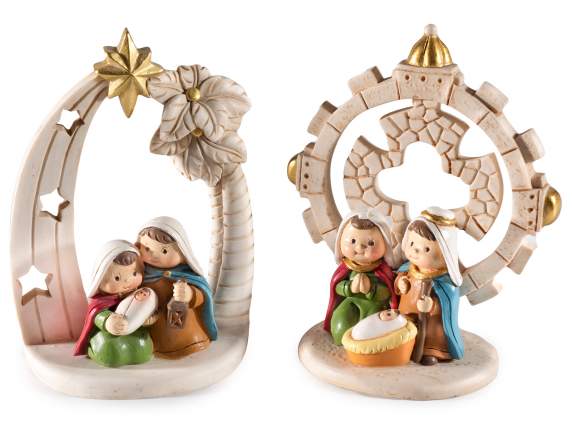 Nativity scene in colored resin with golden details