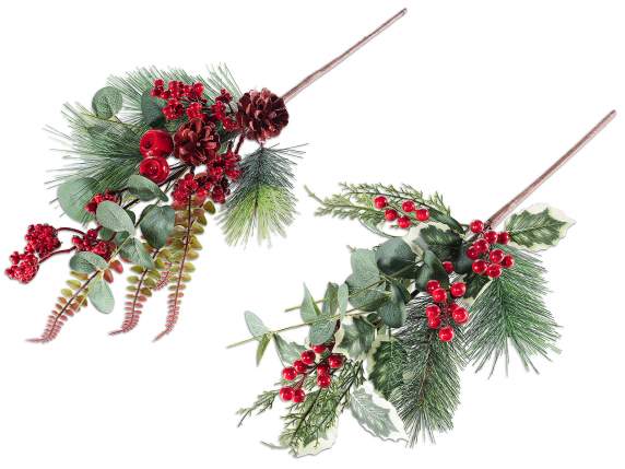 Pine branch and leaves with artificial red berries