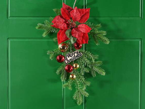 Pine branch with poinsettia, baubles and Merry Christmas tag