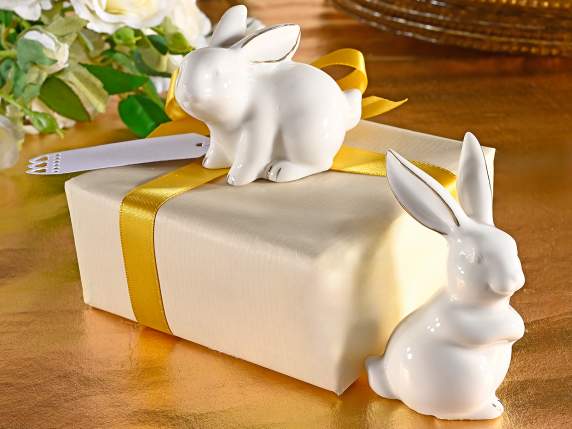 Glossy porcelain bunny with shiny gold-like details