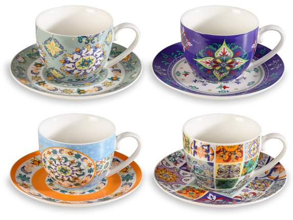 Porcelain tea cup and saucer with Maiolica decorations