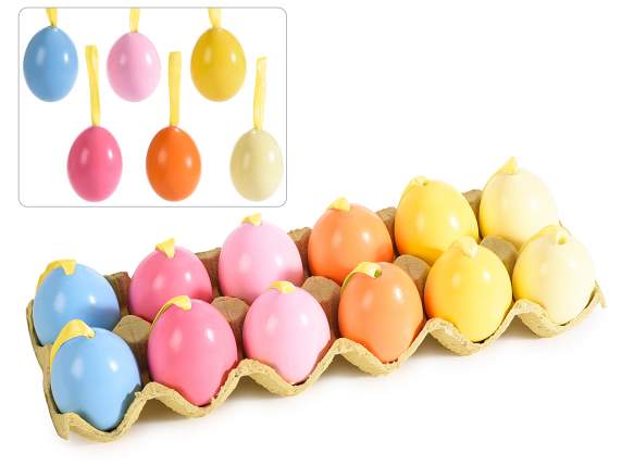 Display of 12 colored eggs with ribbon to hang
