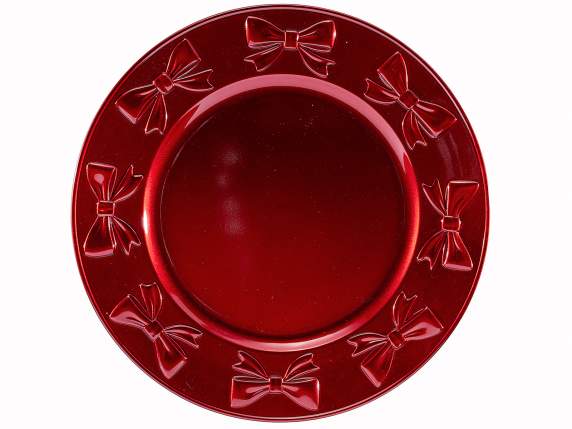 Rigid plastic placemat with colored bow decorations