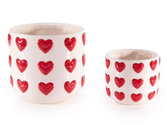 Set of 2 white ceramic vases with red hearts in relief