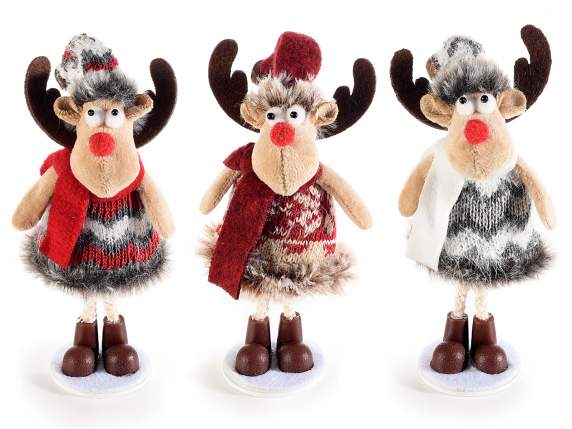 Christmas reindeer in knitted dress and bell on hat