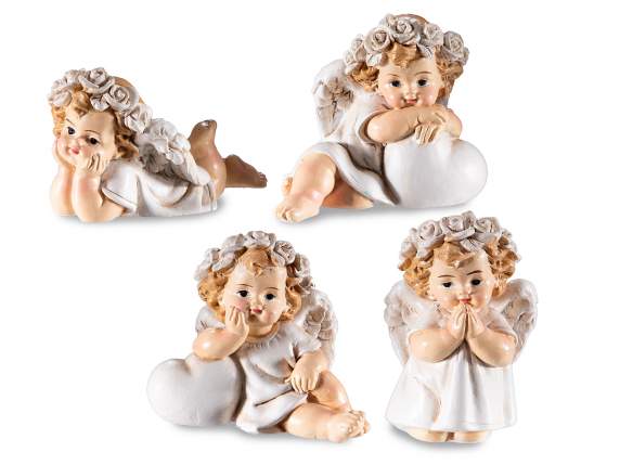 Little angel in colored resin with crown of roses