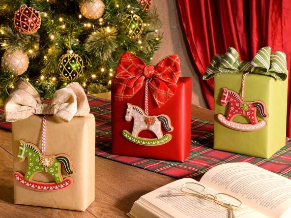Wooden and colored cloth rocking horse to hang