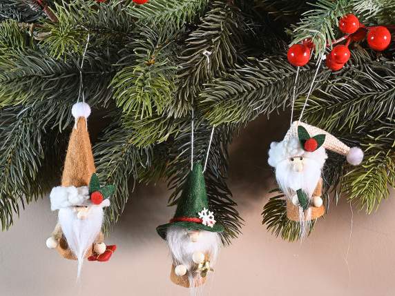 Hanging Santa Claus in cloth with decoration in hand