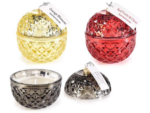 Scented candle in colored glass ball jar