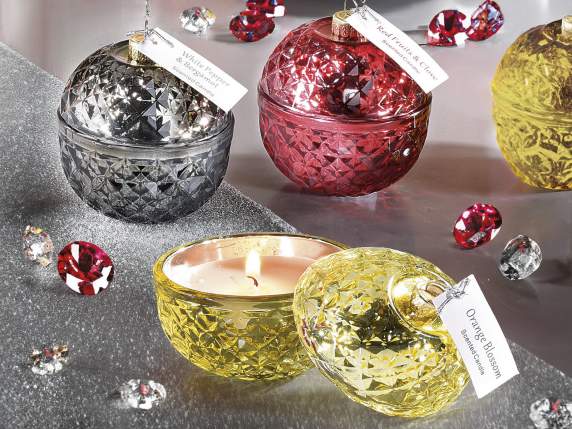 Scented candle in colored glass ball jar