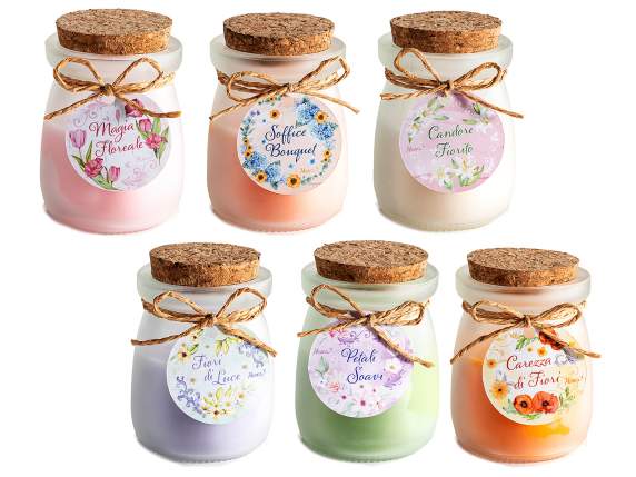 Scented candle in a glass jar with a cork stopper and bow