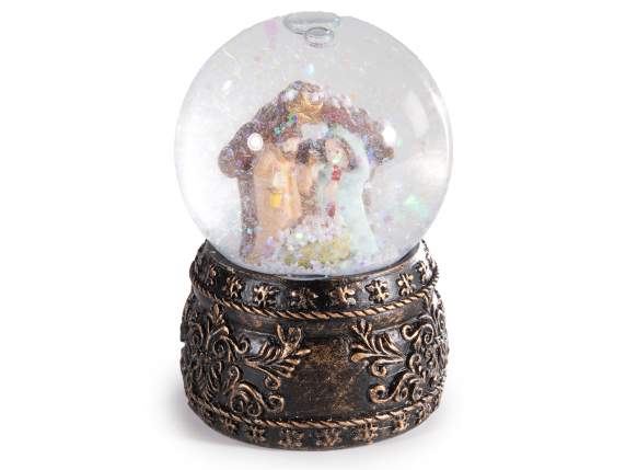 Snow globe with Nativity scene on resin base