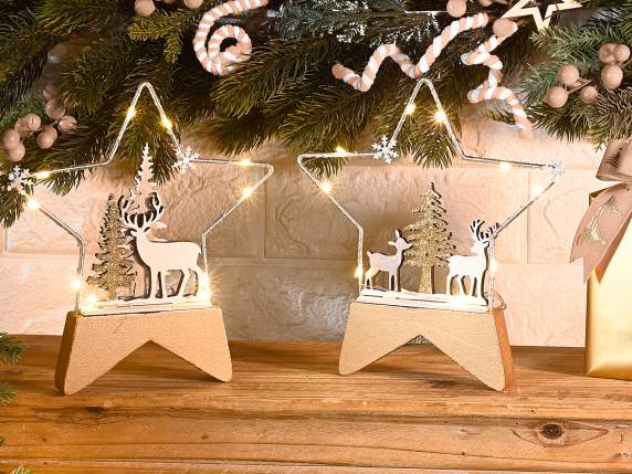 Metal star with landscape and wooden base with LED lights