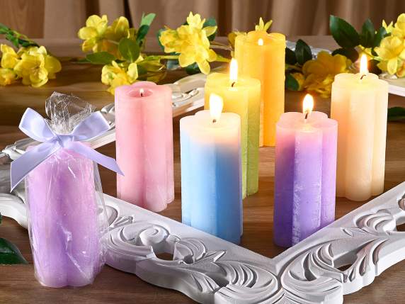 Colorful flower-shaped candle in individual packaging