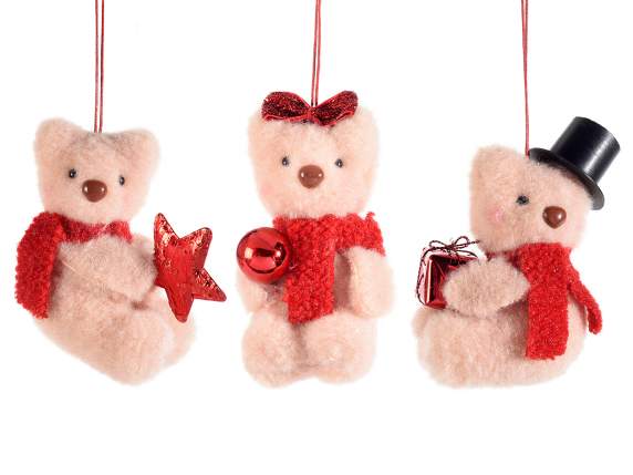Teddy bear in soft eco-fur to hang with decoration in hand