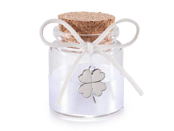 Glass test tube with satin ribbon and four-leaf clover