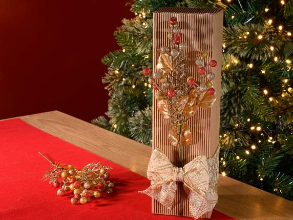 Sprig of red and gold glitter berries and golden leaves