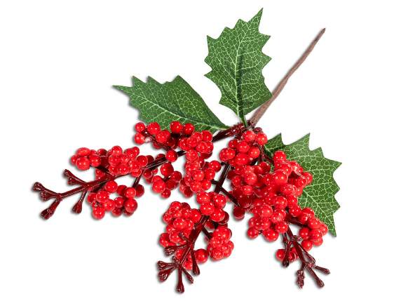 Sprig of red berries and green leaves
