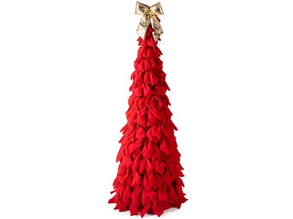 Christmas tree with red velvet bows and golden bow