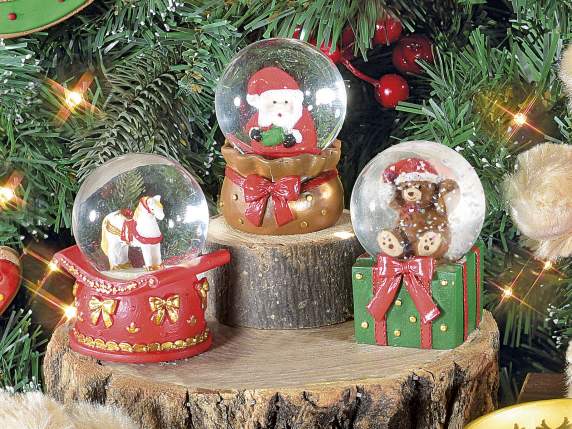 Snow globe w-VintageToys character in resin, on display