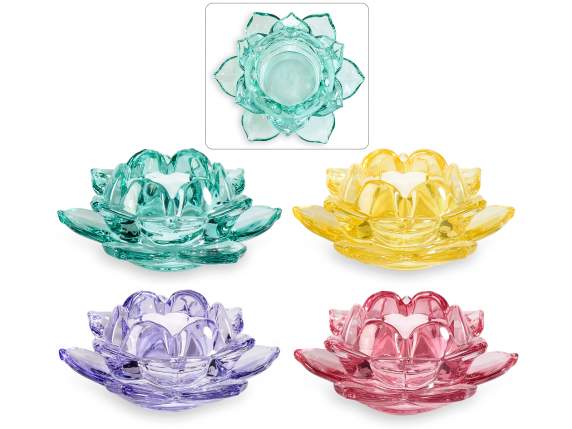 Colored glass tealight candle holder in the shape of a water