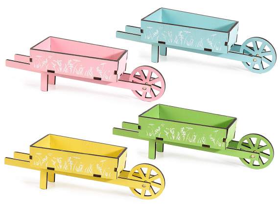 Decorative colored wooden wheelbarrow with flower decoration