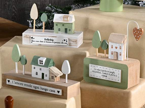 Decorative wooden landscape with houses, trees and writings
