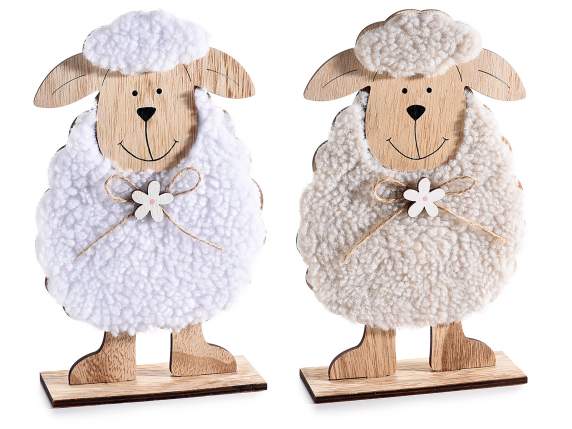 Wooden sheep with soft coat and flower on a wooden base