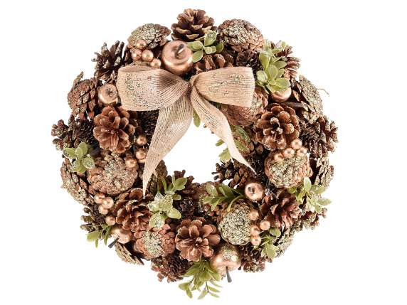 Wreath with glitter apples, pine cones, berries and bow