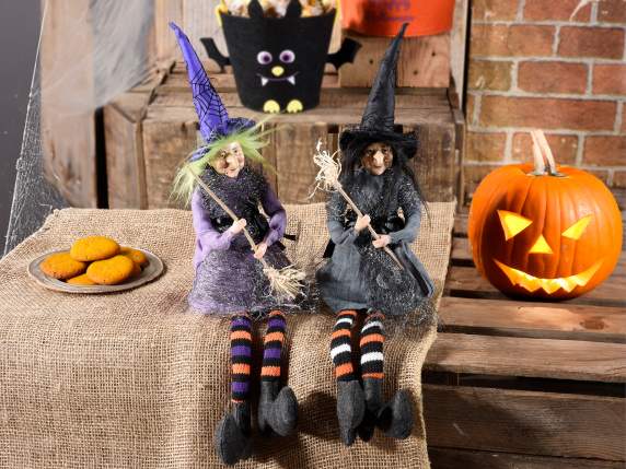 Befana Witch long legs in cloth with hat and broom