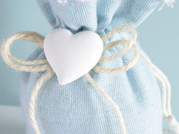 Light blue fabric bag w - lace, plaster heart and tie rod