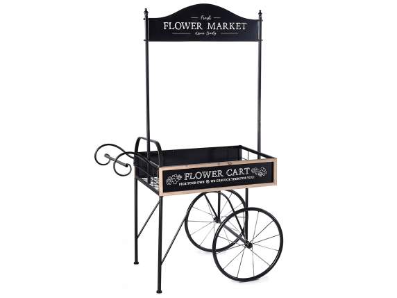 Black metal display cart decorated with sign