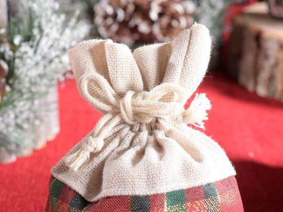 Woven bag with gold threads, cotton edge and drawstring