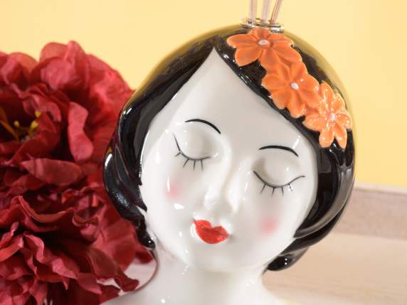 Glossy porcelain womans face with perfume stick