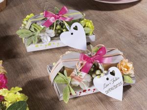 Bomboniere profumate con candele floreali